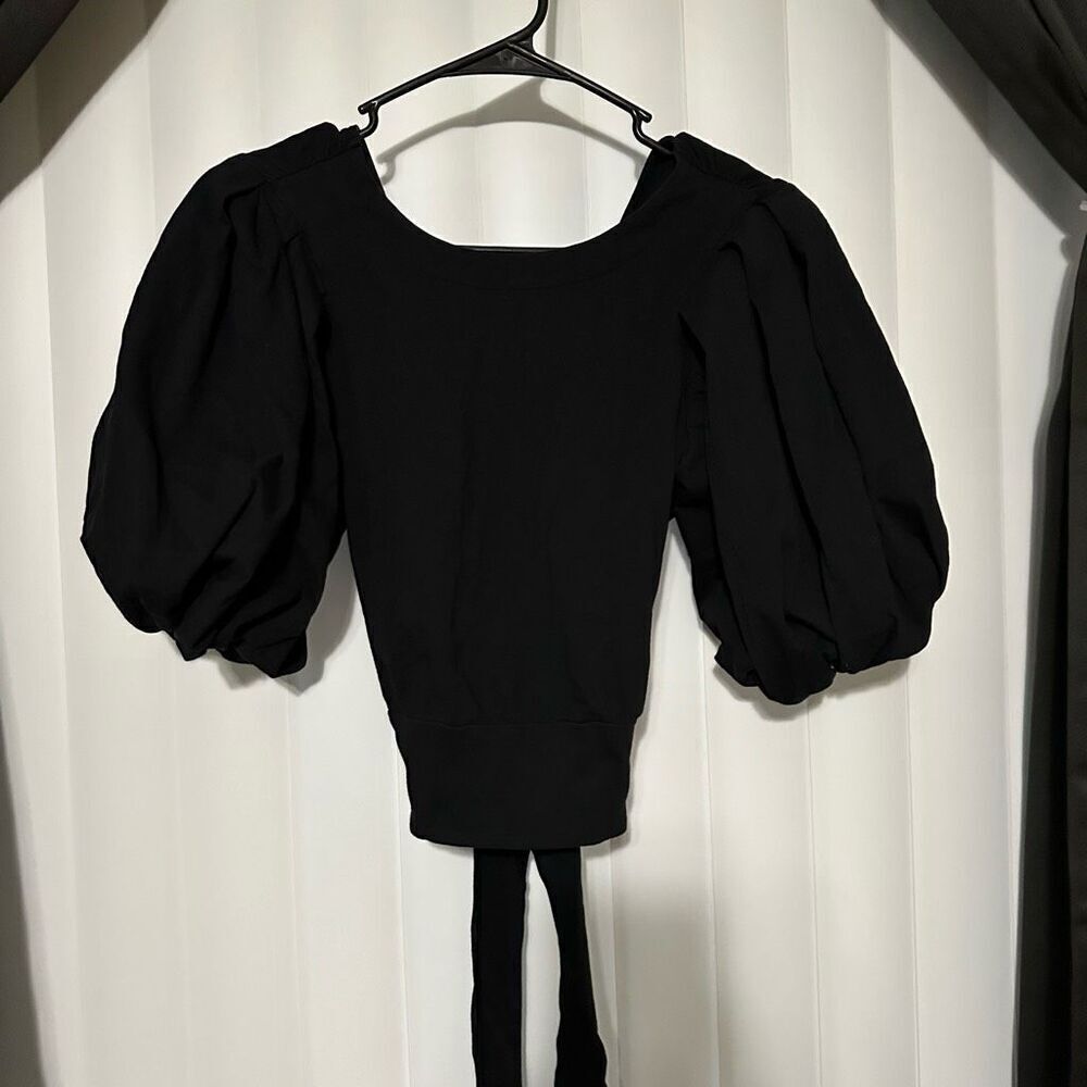 Express black tie back , can be crop top on some figures, pair with jeans for ex
